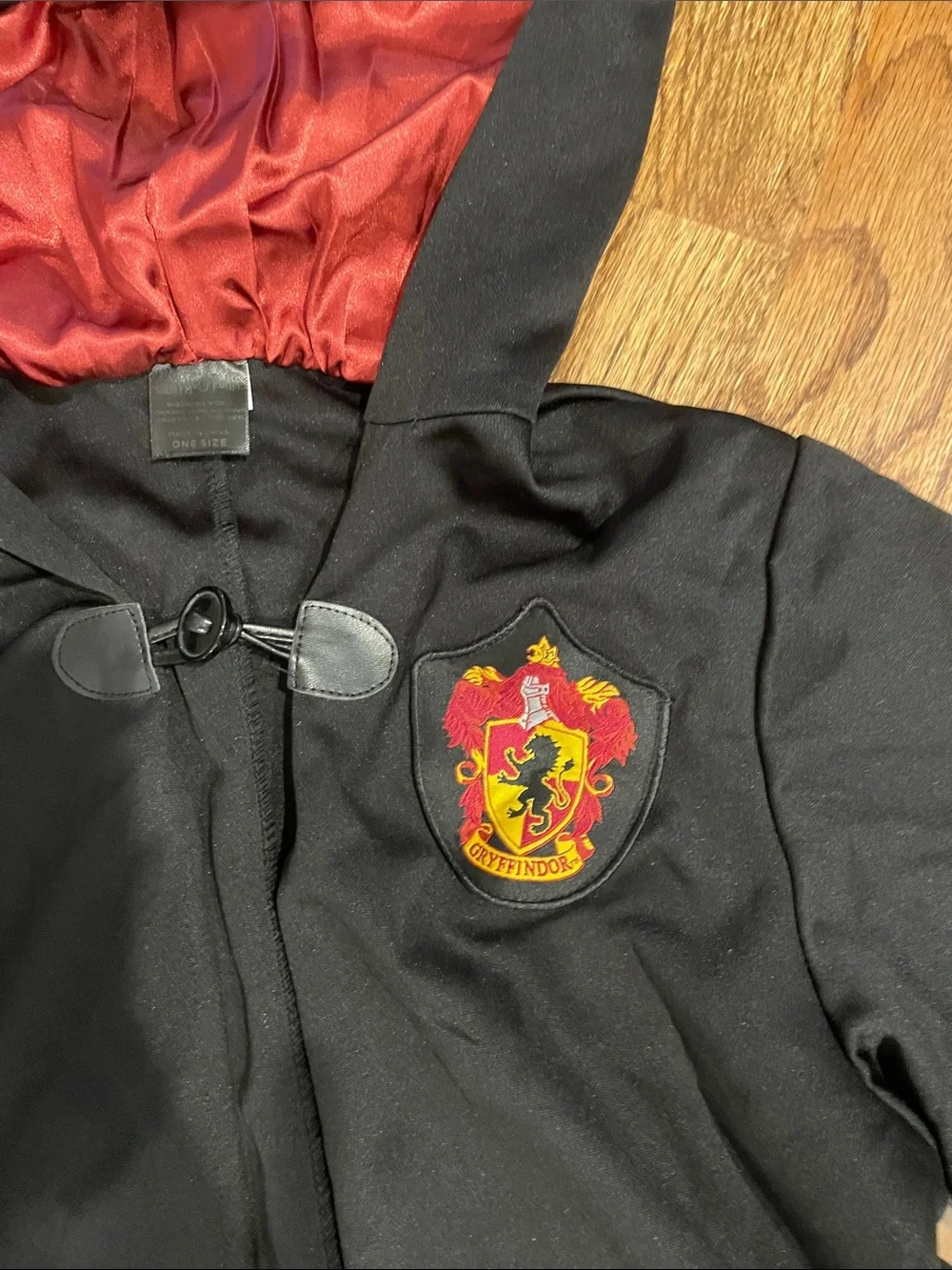 Harry Potter Spirit Black Hooded Coat with Red Lining and Gryffindor Crest youth